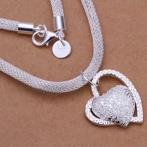 Bold Silver Heart Pendant Necklace with Textured Design